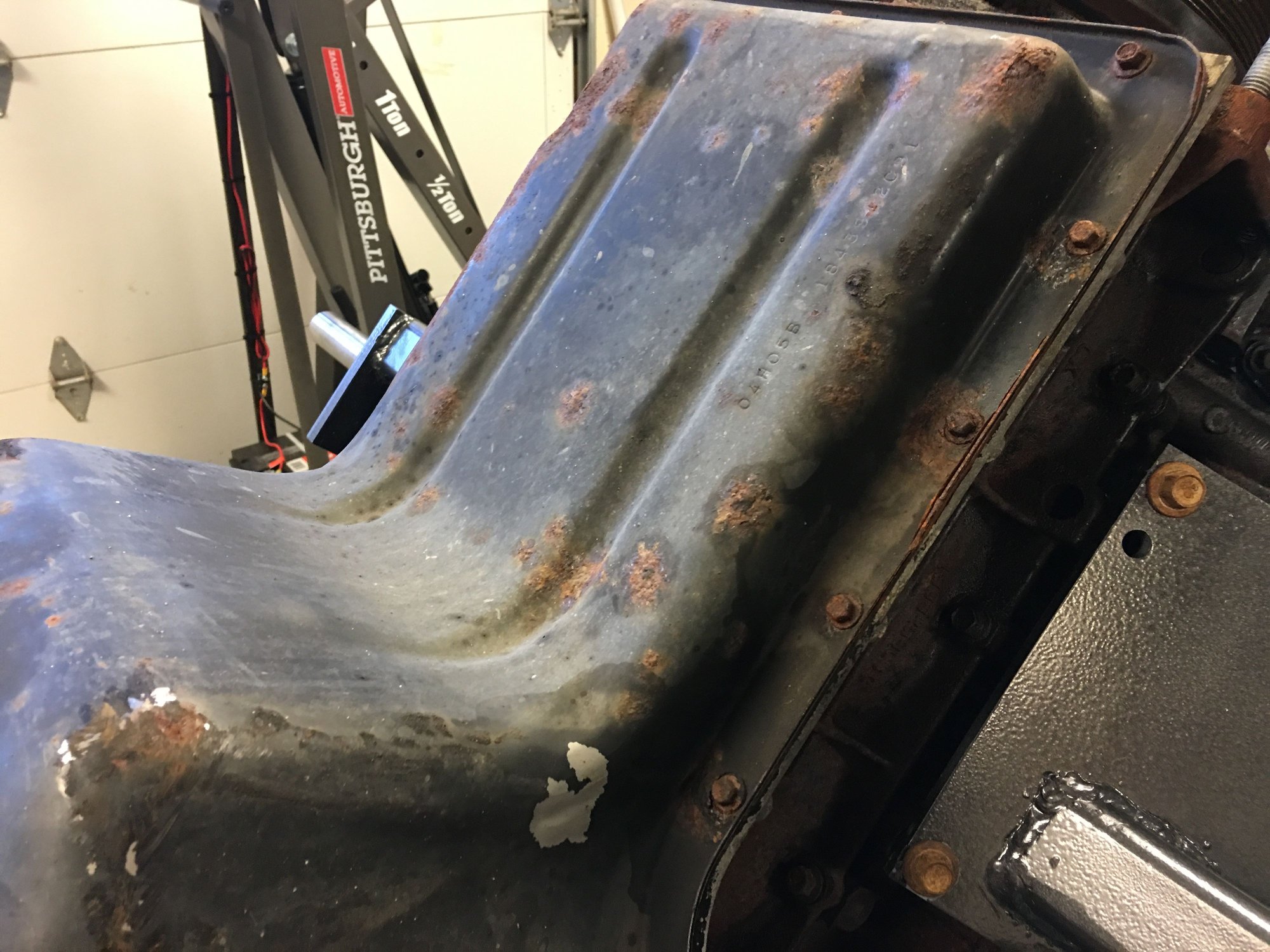 Oil pan rust/paint coming off of inside of oil pan as well Ford Truck