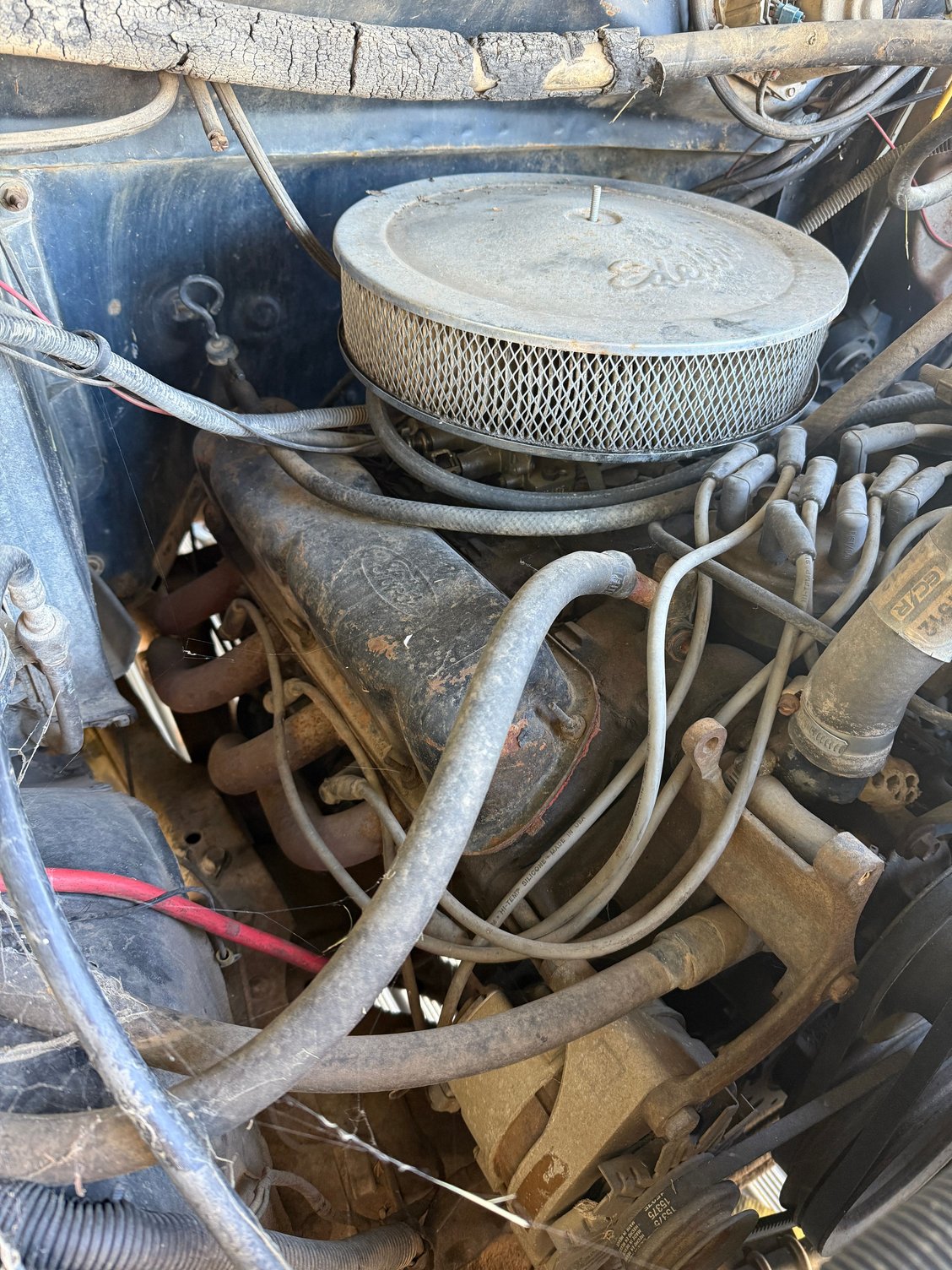 351 with aftermarket air cleaner, carb, and headers. 