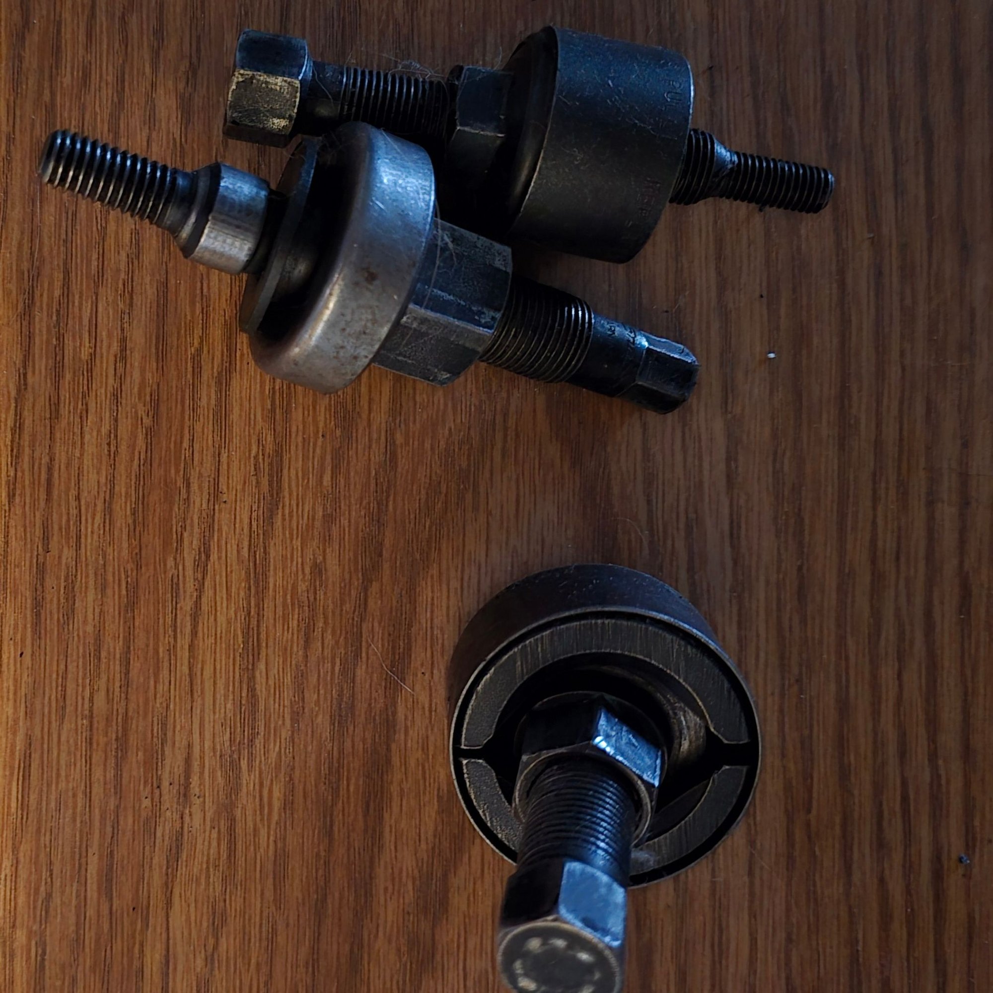 These three were about 150 bucks total back in the 90's. That top one is a Ford OTC special tool just for the new 4.6l ZF pumps (have a smaller metric thread in the pump shaft) 