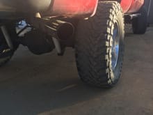 This is the tire in mention. I noticed the driver side doing the same, but not as much.  I'm hoping it's bearings and not a bent axle tube. 