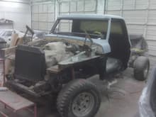 Truck with cab on frame with interior painted.  No bed, doors, windows, hood fenders radiator core..pretty stripped down