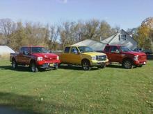 family trucks my 04 my bros 06 and my dads 08