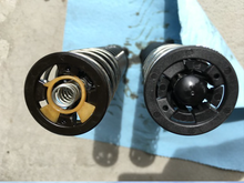 This shows yellow Fram adapter disc inserted in OEM standpipe