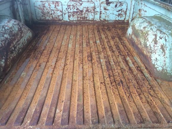 Bed has surface rust but is solid and all there.