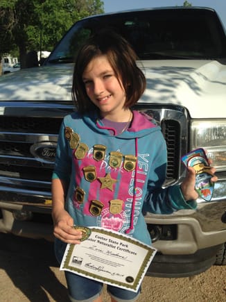 Some of Zoie's Jr. Ranger baqdges/patches/certificates she has achieved in the last 2 years from National/State parks