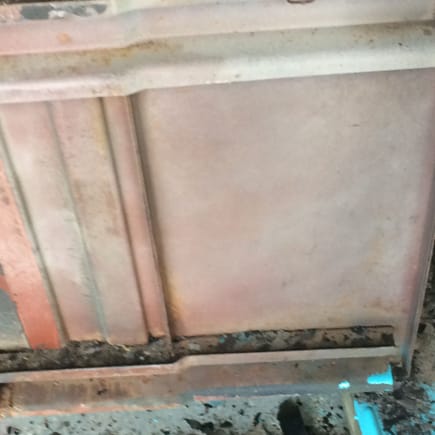 here is the original red lead primer which was underneath the factory original black bitumen or whatever they put on in 1965