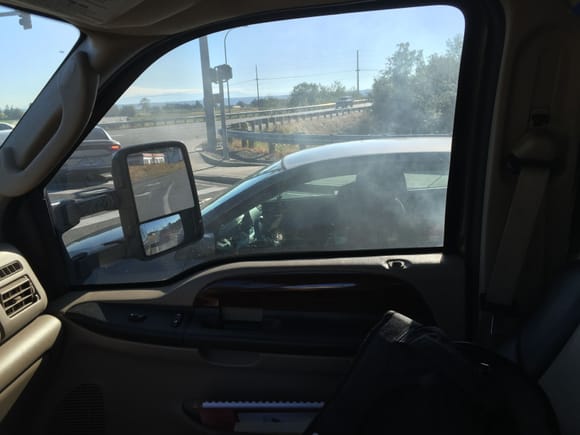 At a stop light. That is my smoke blowing up past the passenger's side, I had to roll the window up.