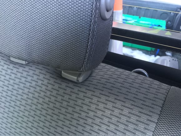 Pull handle as seen looking over back of rear seat