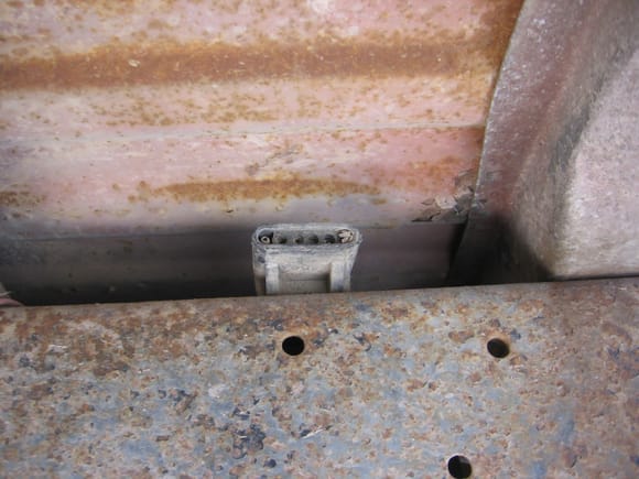 camper special plug on the drivers side frame rail just behind the cab