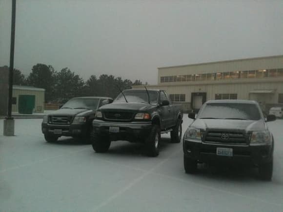 Parker between a Toyota and a f150.  Both 4x4s