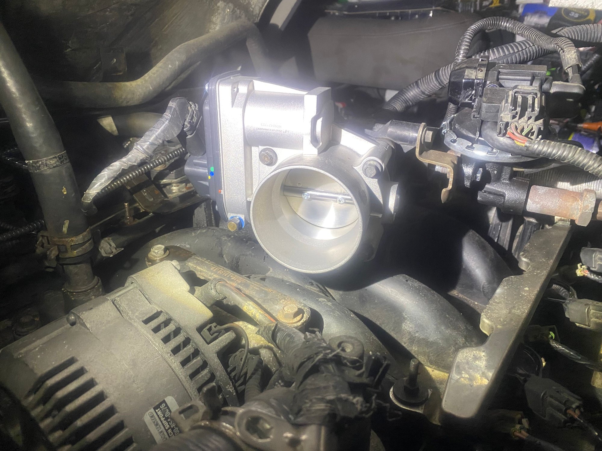 This is to show that I can not locate IAC VALVE anywhere around throttle body EGR is to the right there is nothing in back of it