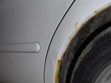 Driver's side dogleg showing rust on '02 Taurus