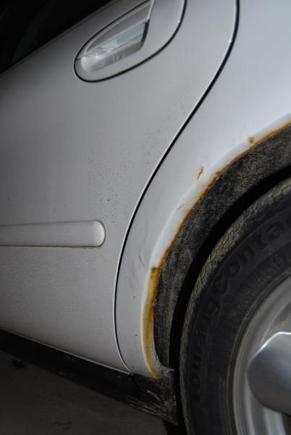 Driver's side dogleg showing rust on '02 Taurus