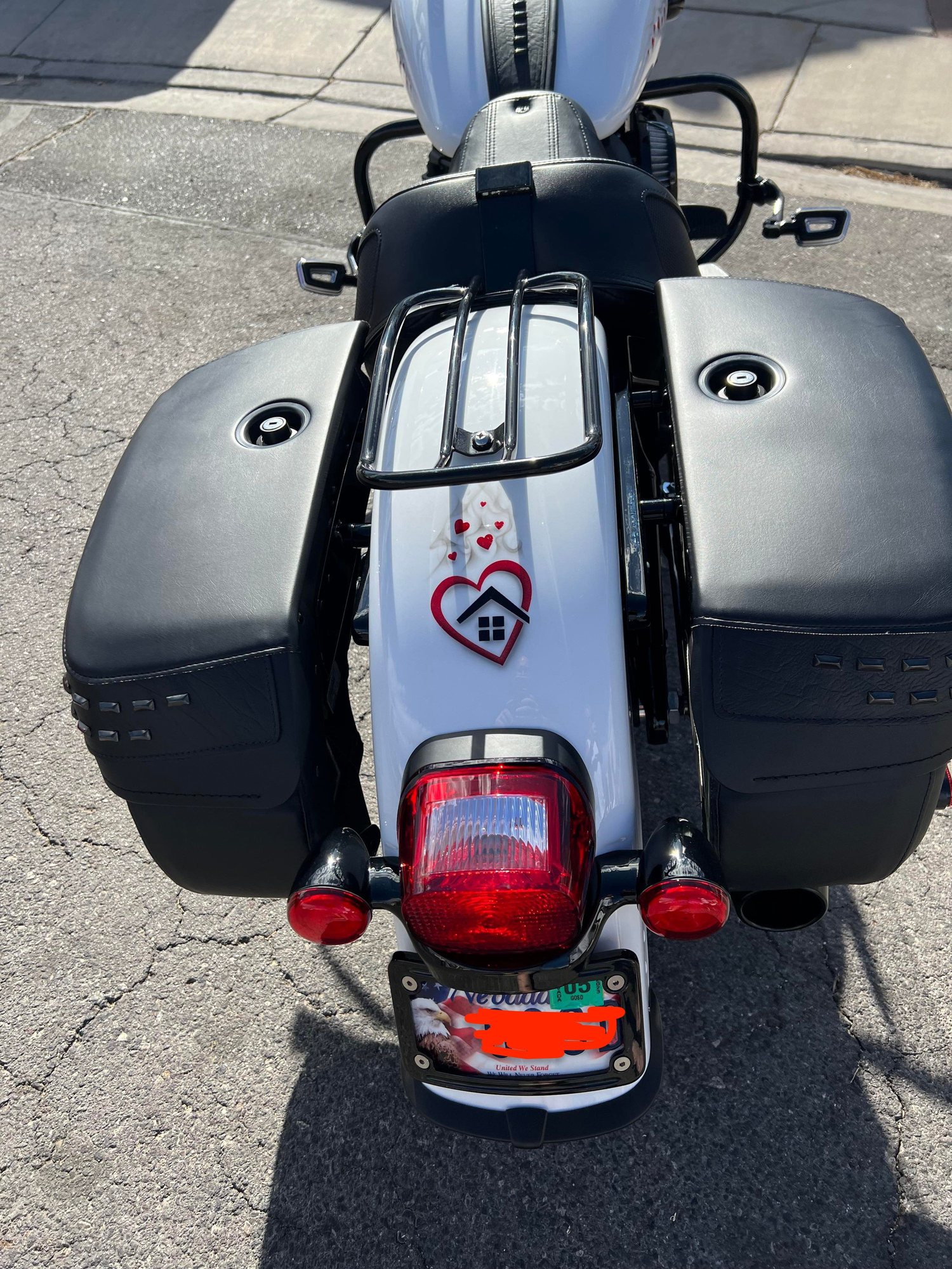 2018 FLHC/S license plate relocation (under tail light)? Harley