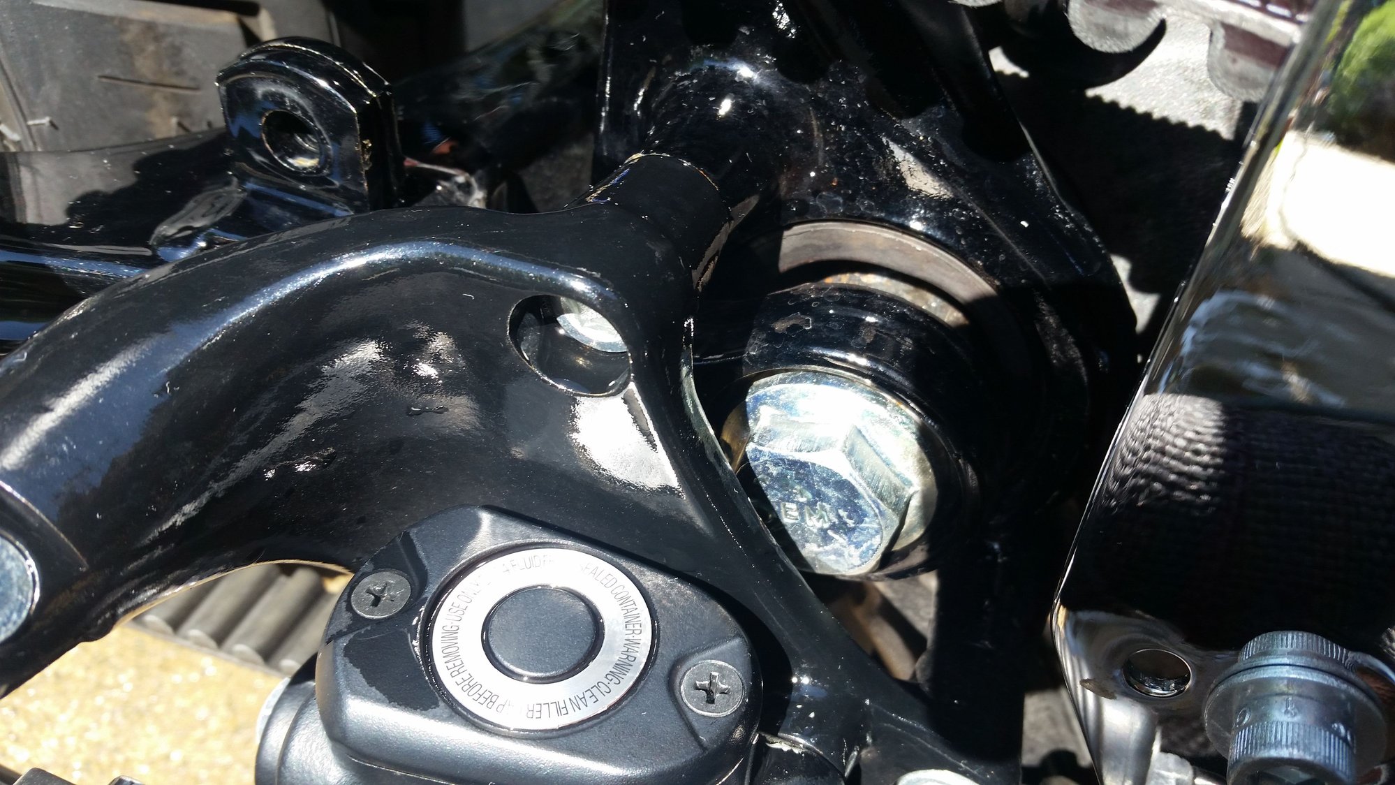 Swing arm bolt looks loose Harley Davidson Forums