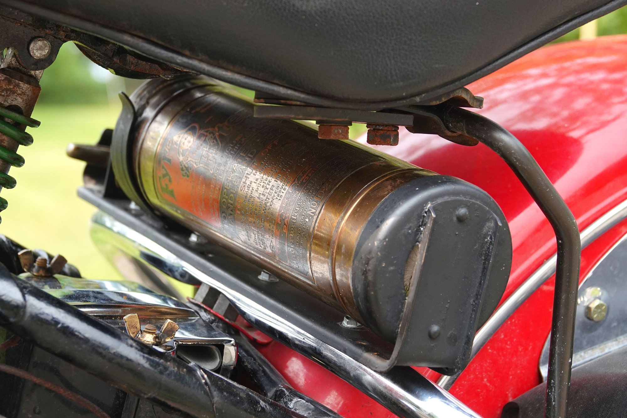 Retro brass extinguisher. It has a small spray extinguisher inside.