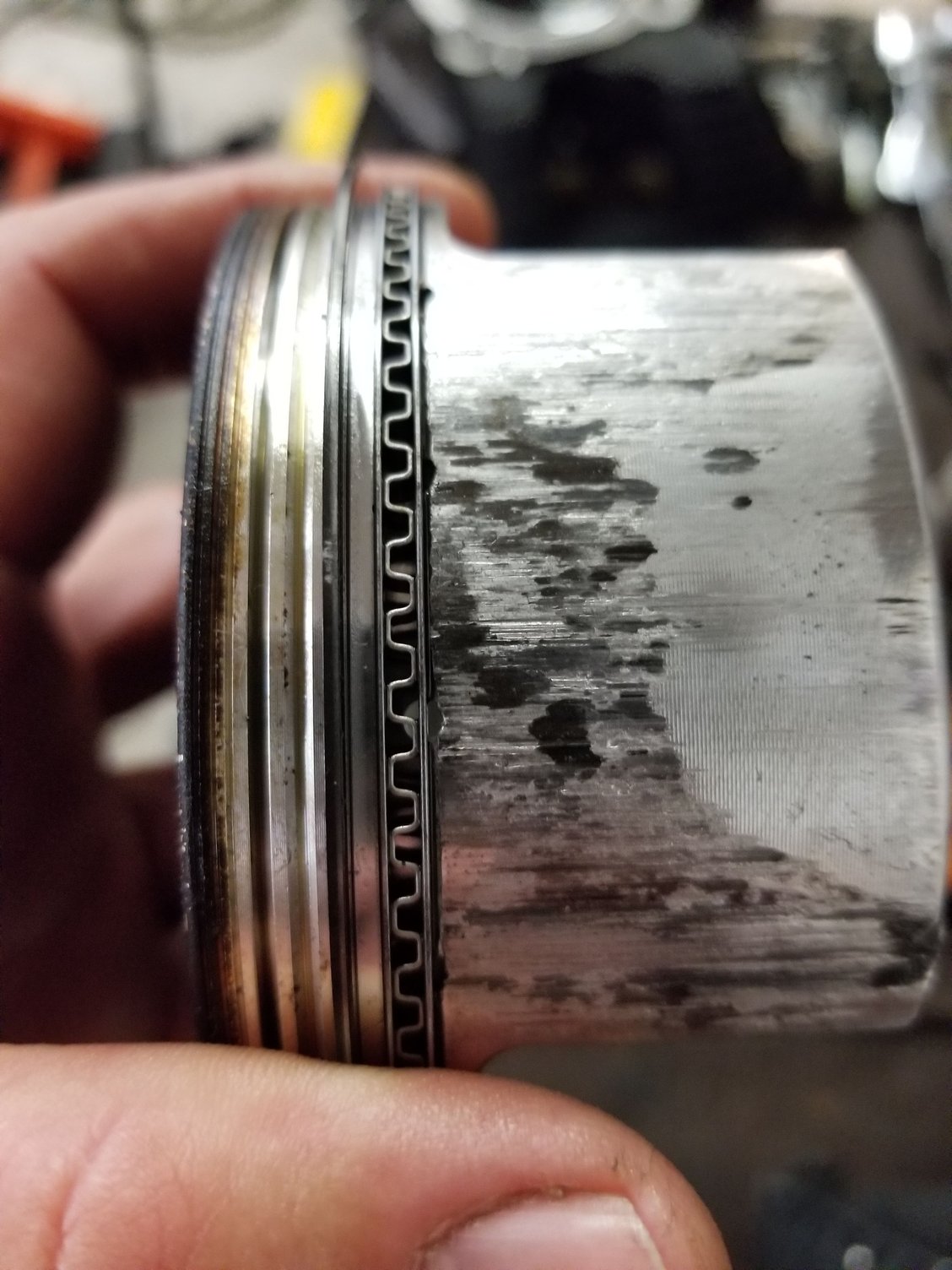 Loud knock and severe piston galling after 500 miles on rebuilt motor