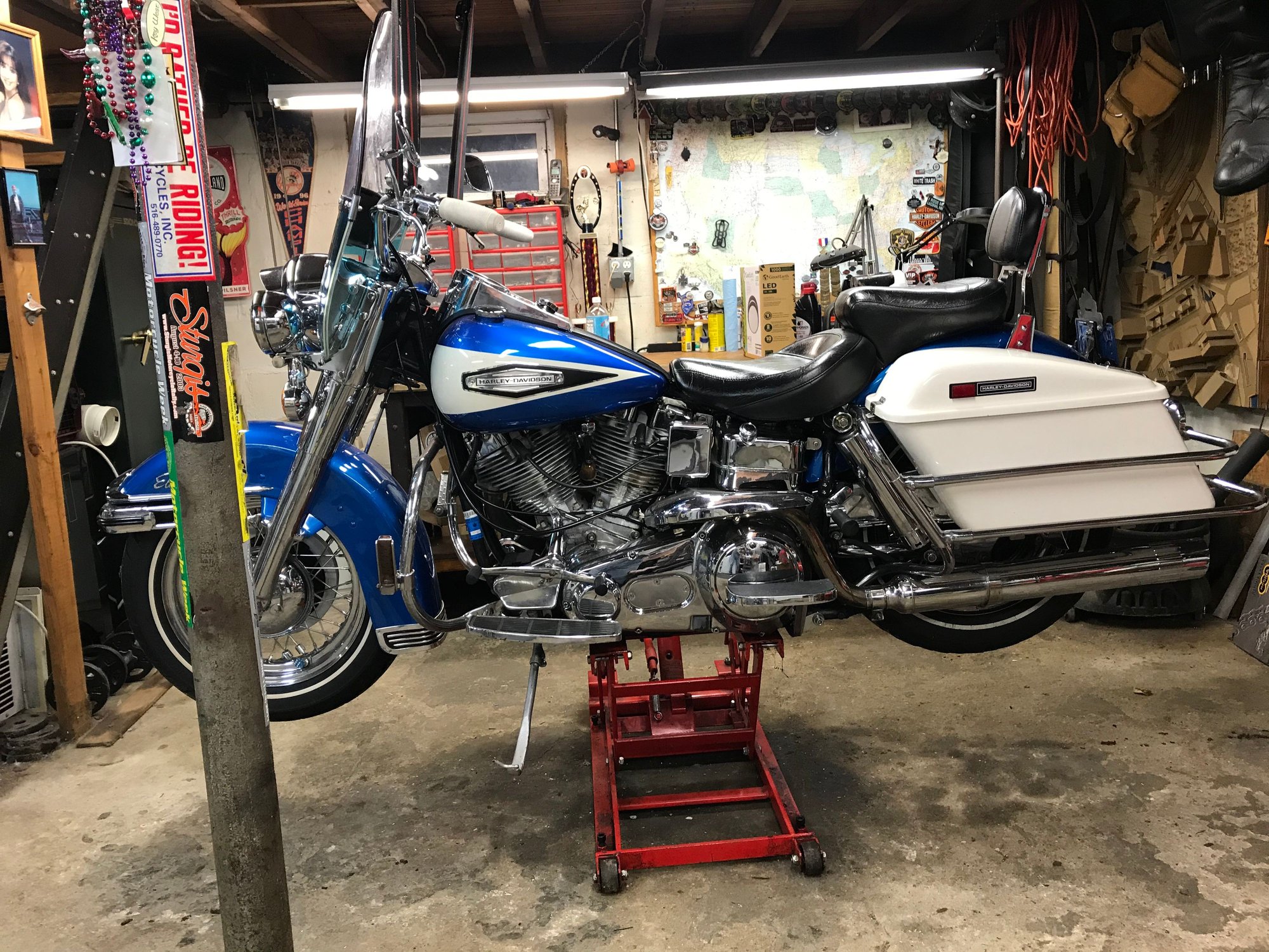 Main work area with bench behind the bike.
