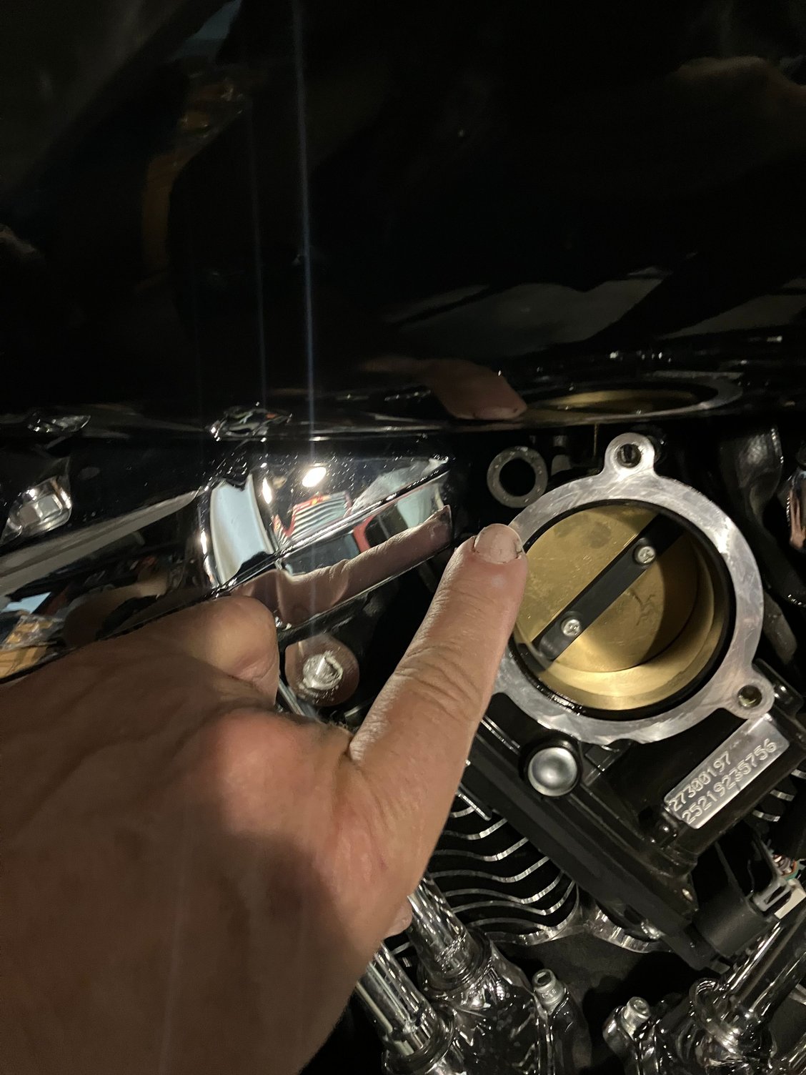 The hose that brings the hot oily air.