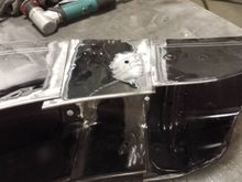 A close up of the skirts fitted inside the stock fender from the donor fender
