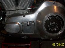 Primary gasket / primary back on. Be careful where the longer screws go! On my primary cover it was the one to the left of the drain plug, the one directly above that one, and the one closed to the top swing arm cover; in a triangle pattern.