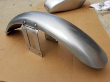 Bare metal rear fender.