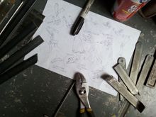 Started off with some rough sketches, then cutting the metal, bending, then welding them together...