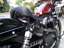 The finished project mounted, it somehow exposed the "butt" of the stock seat. I have to cover that up somehow...