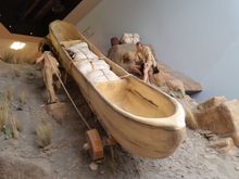 This is from the Lewis and Clark museum. Depicts the portage of one of their dugout canoes around the falls. These things weighed hundreds of pounds! The slope is exaggerated because of the limmited space available for the display, but accurately matches the description written of the method and the struggle.