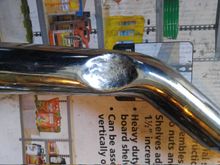 I had to dimple (well, I guess dent is more appropriate) the rear pipe to clear the throw-out lever.  And then some more, to clear the nut that holds the lever on the shaft.