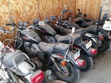 1999 XL883. My second Harley. I installed a Tachometer, RB Racing 2 into 1 exhaust, Screaming Eagle high flow intake, Ricor Intimidators in the front fork tubes, heavier fork oil, and a passenger backrest. The '99 883 Sportster is second from the left, next to a White 1975 Norton 850 Commando. 7 out of 9 of my motorcycles are in this photograph. 