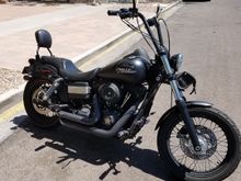 The day i bought the bike. If you expand the pic you can see the dented tank and if you look close at the bars you can see the right side is bent back 4".