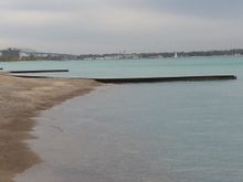 
A view at the waters edge with the “Bluewater Bridges” in the distance. These bridges join Canada to the USA.