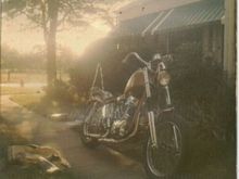 First Harley-56 Panhead: bored, cams, 4 over forks.
Different paint.