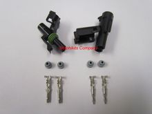 Got these from eBay. They work great. Split the wire underneath the seat.