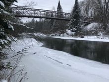 Snowmobile bridge over the Manistee river.