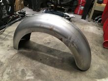 Got my rear fender from Lowbrow customs (made by Ledsled). It’s sized for stock size tires which I decided to stick with.