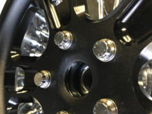 Size of the hole. Significantly smaller than the stock pulley hole. Wouldn’t think there were thinner walled spacers for these? Be some mighty thin walled spacers if so. 