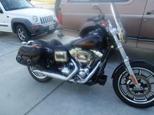 Lots of mods over the winter, but I think I'm almost done...lol
HD Daymaker, Joker mirrors,Saddlemen seat,Race Tech God Valves,Ohlins Blackline shocks,30/68 pulleys,Baker Timkem main drive kit, Jim's trap door,AIM VPC,Predator mount, SE CNC heads,S&S 110",SE 50mm TB,SE-259 cam, Rocker lockers,Axtel oil bypass, Red Shift tensioners, Ultra Cool,R&B LSR 2-1, TTS, Baker Attitide tensioner..Lot's more little stuff.
