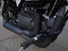 Vance and Hines Competition Series 2 into 1 exhaust with Thermal wrap.