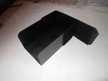 Partialy folded.  The bends made at score lines made in the poly gently.