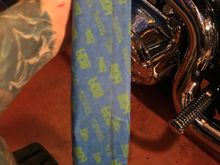 He eventually stopped returning my calls, leaving me to figure things out on my own.  I decided the cheapest route was to cut the guard.  It was scratched so screwing it up wasn’t a concern. 