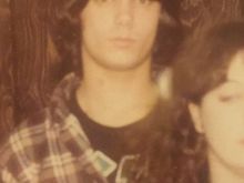 Everybody had long hair in the eighties no? Me after a fresh haircut. Notice ac/ dc shirt under the flannel, way before grunge took off. You never slow down, you never grow old. Keep riding!