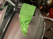 I tape mine to the gas cap, I can keep track of both..