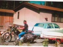 1984 FXST with a trailer I made. I could haul a ton of shit with it. Rode the hell out that bike and to this day, I kick myself in the ass for letting it go. It took me to Sturgis and back in 1987 and never missed a beat. 