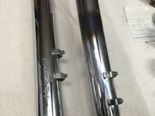 the discoloration which is under and on the inside of the bags on the right