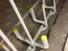 Rough plumbing for public restrooms.