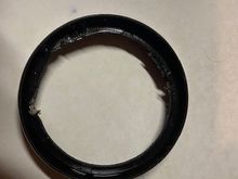 Crank sprocket shaft seal, side facing the primary. Rubber removed, so one can see the metal part of the seal.