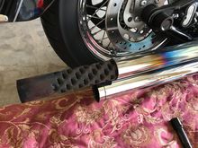 Heat shields have to come off to access the baffle retention screw.  The pipes do not need to come off.