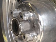 After the floating rotor buttons all broke, the rotor chewed the crap out of my rotor bolt thread housing